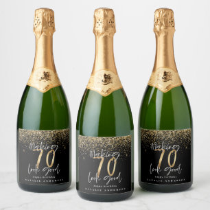 Moderne typografie goud glitter chic 70ste verjaar sparkling wijnetiket