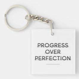 Moderne typografie vooruitgang boven perfectie tek sleutelhanger