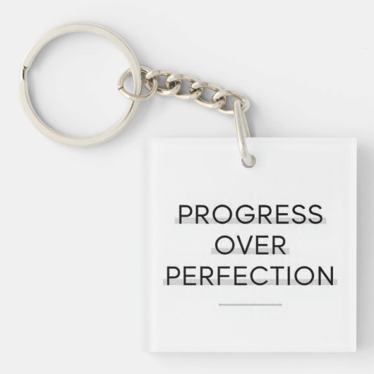 Moderne typografie vooruitgang boven perfectie tek sleutelhanger (voorkant)