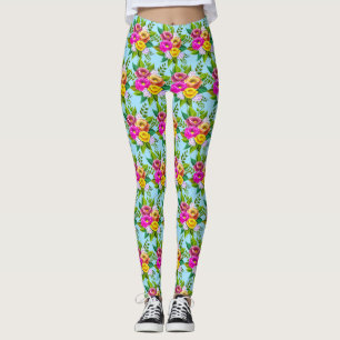 Moderne veelkleurige bloemen op lichtblauw leggings