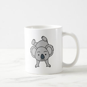 Moe babykoala met een glimlach die een handstand d koffiemok