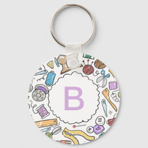 Moeilijk naai ambachtelijke doedels monogram sleutelhanger