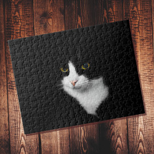 Moeilijke zwart-witte kat op effen zwart legpuzzel