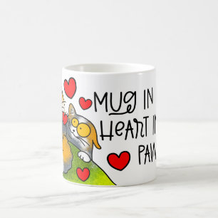 mok in haar handen, hart in haar poten
