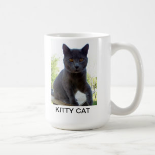 Mok met kattenfoto en woorden KITTY CAT erop.