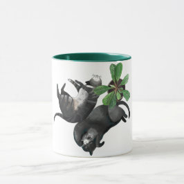 Mok | Twee katten liggen bij een plant