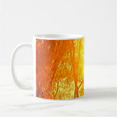 Mok van zon- en boomkoffie (Links)