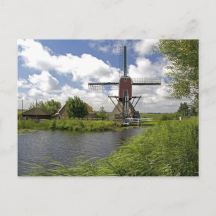 Molen langs een kanaal ten oosten van Leiden in de Briefkaart