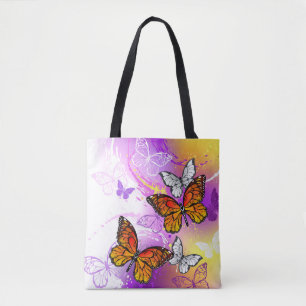 Monarch Butterflies op Paarse achtergrond Draagtas