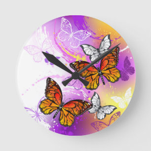 Monarch Butterflies op Paarse achtergrond Ronde Klok