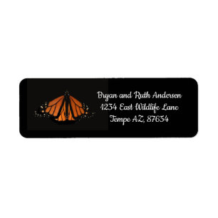 Monarch Butterfly in de sleutel van het Sinaasappe Etiket