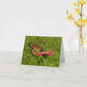 Monarque sur la carte de note de fleur (Fleur jaune)