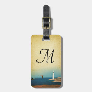 Monogram bagagelabel met strandtafereel met vuurto