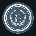 Monogram design<br><div class="desc">Conception de monogramme avec décoration de couronne de laurier en forme arrondie rayée sur arrière - plan bleu</div>