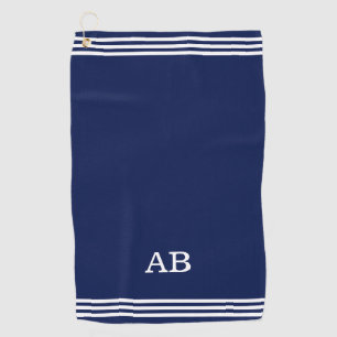 Monogram en drie strepen op een navyblauwe golfhan golfhanddoek