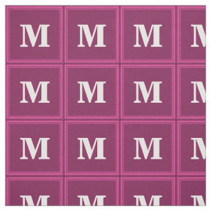 Monogram fuchsia stof