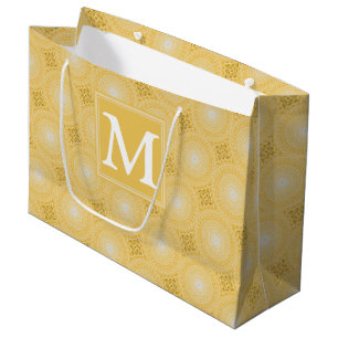 Monogram geel cirkelpatroon groot cadeauzakje