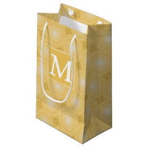 Monogram geel cirkelpatroon klein cadeauzakje