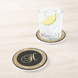 Monogram H goud Zandsteen Onderzetter