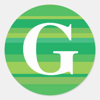 Monogram met een kleurrijke gestreept achtergrond  ronde sticker