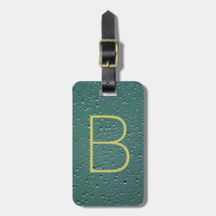 Monogram op Regendruppelstructuur Bagagelabel