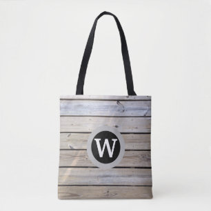 Monogram op strand houten planken draagtas