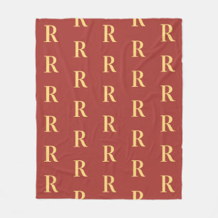 Monogram patroon bruin goud fleece deken