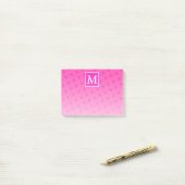 Monogram patroon van hete roze cirkels post-it® notes (Op bureau)