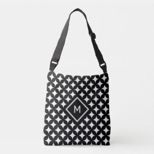 Monogram & vierpuntig sterpatroon op zwart crossbody tas