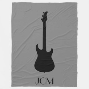 Monogram zwarte elektrische gitaar op medium grijs fleece deken