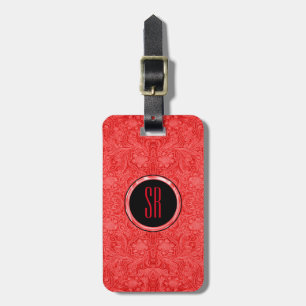 Monogramed rood faux suède leer look bagagelabel