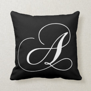 Monogramme blanc noir un coussin décoré d'un