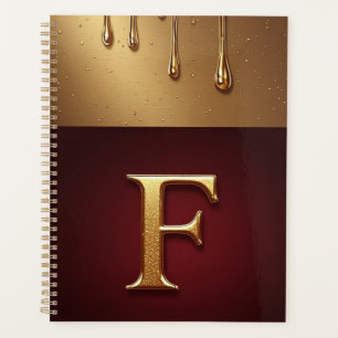 Monogramme de lettre F dorée avec métal qui coule