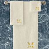 Monogramme d'or beige neutre