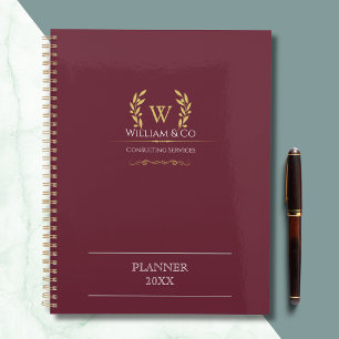 Monogramme d'or de la couronne de laurier classiqu