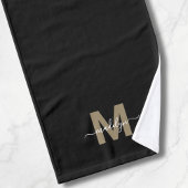 Monogramme élégant à l'encre dorée et noire