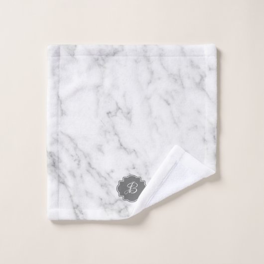 Monogramme en marbre blanc et gris (Gant de toilette)