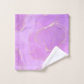 Monogramme en or rose marbré (Gant de toilette)