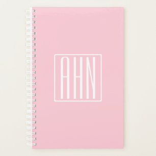 Monogramme initial Blanc sur rose clair