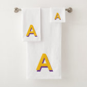 Monogramme jaune doré sur fond blanc (En situation)