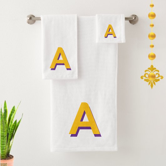 Monogramme jaune doré sur fond blanc
