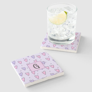 Monogramtekening van grillige kleine hartjes roze stenen onderzetter