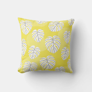 Monstera leaves, bright yellow background. kussen
