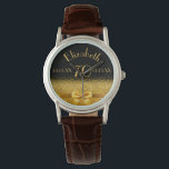 Montre 70e anniversaire noir or monogramme élégant<br><div class="desc">Élégant, classique, glamour et féminin. Un arc et un ruban doré à la parties scintillant dorée et brillant, un peu de bling et de luxe pour un anniversaire. Arrière - plan noir. Modèles pour son nom, son âge, sa date de naissance et sa date anniversaire. Une montre cadeau anniversaire pour...</div>