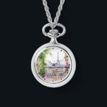 Montre Aquarelle Tour Eiffel Paris Café français<br><div class="desc">Aquarelle Tour Eiffel Paris French Cafe Watch Collier dispose d'un coin salon de café français aquarelle avec Paris et la Tour Eiffel en arrière - plan. Créé par Evco Studio www.zazzle.com/store/evcostudio</div>