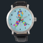 Montre Autisme Ruban bleu<br><div class="desc">Beau ruban autiste rempli de puzzle de toutes les couleurs de l'arc-en-ciel. Un joli cadeau de sensibilisation sur l'autisme sur un visage d'horloge.</div>