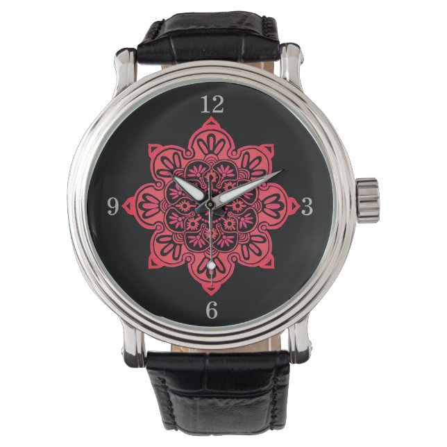 Montre avec médaillon rouge sur le visage noir (devant)