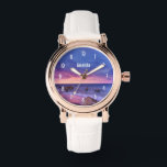 Montre Belle photo côtière du coucher de soleil<br><div class="desc">Une montre avec une belle photo aux couleurs frappantes de violet,  bleu et rose au coucher du soleil. Un joli littoral parsemé de rochers.</div>