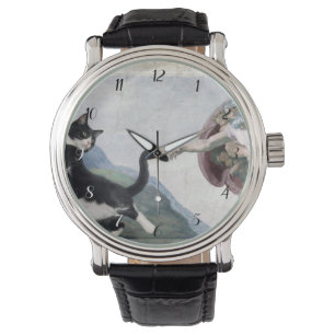Montre Chat Tuxedo touchant la patte divine