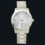 Montre Chiffres romains en argent métallique brillant Mon<br><div class="desc">Image élégante,  fine et minimaliste d'impression en acier inoxydable argenté brillant avec des chiffres romains et un monogramme personnalisable.</div>